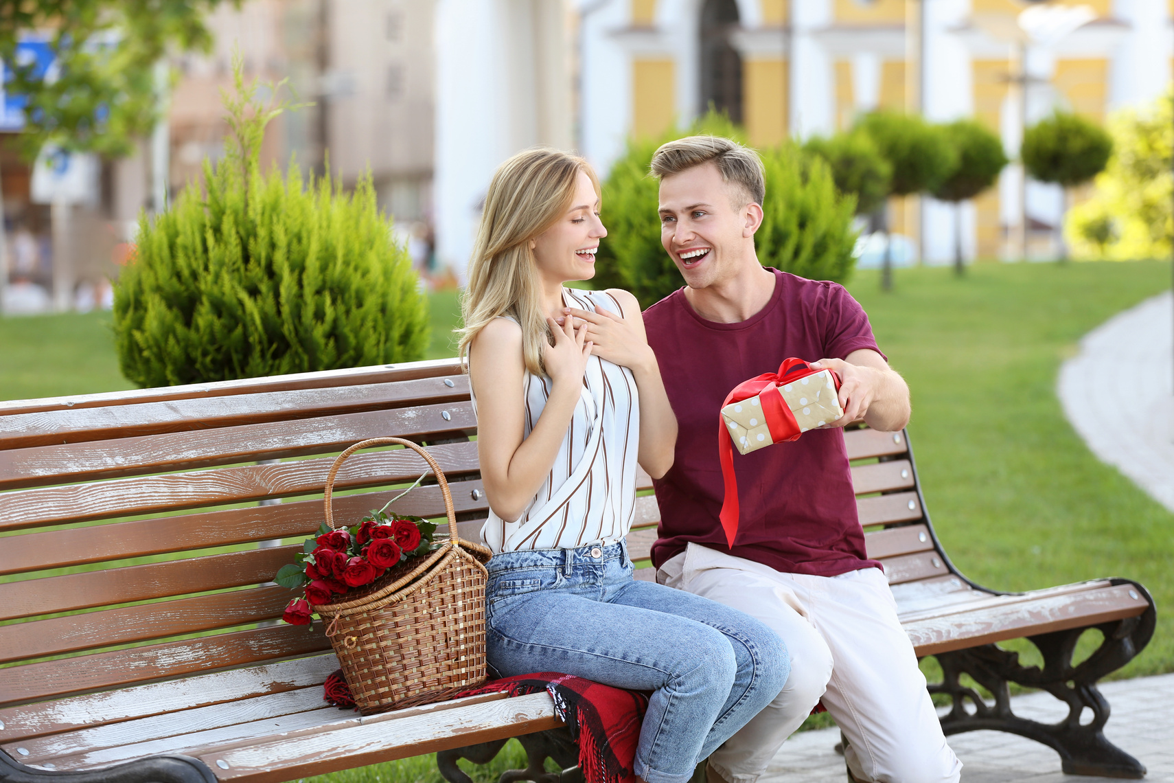 Young Woman Receiving Gift from Her Boyfriend 